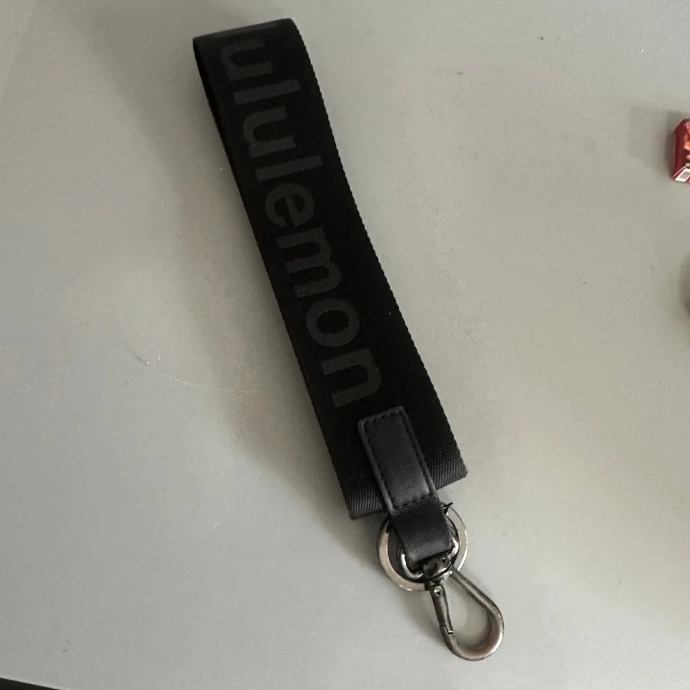 Lululemon Never Lost Keychain Wristlet Black Webbing Logo Lanyard Strap